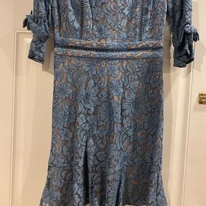 NWOT Light blue women dress. In excellent condition.